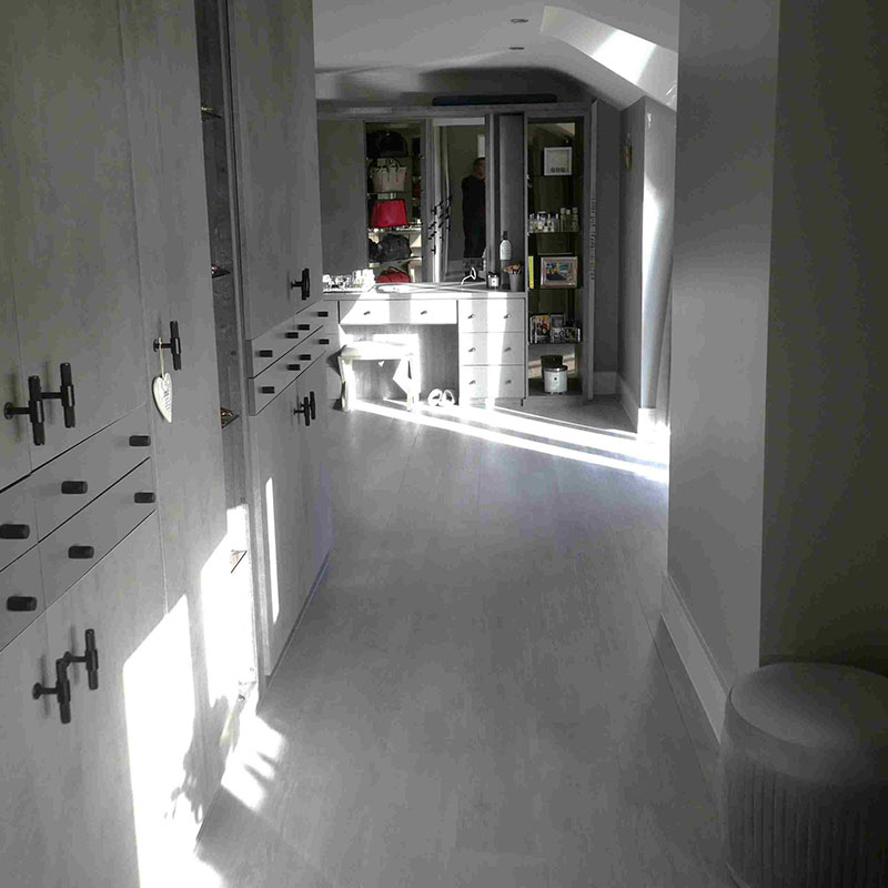 Photo of furniture throughout the walking wardrobe & dressing room.