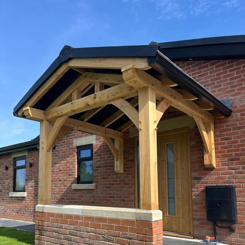 Construction of this new-build residential property features design-led features such as this solid oak entrance porch