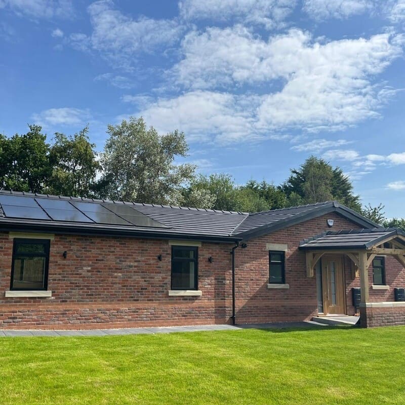 The Stables development in rural Mawdesley features the use of carefully chosen building materials to compliment the environment