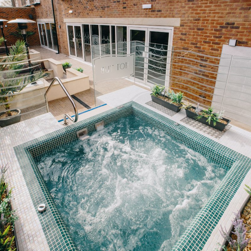 PAB Architects’ architecture and design expertise in action at Mawdesley’s premium health facility in West Lancashire, including outdoor hot tub area forming part of the site’s swimming pool and leisure complex